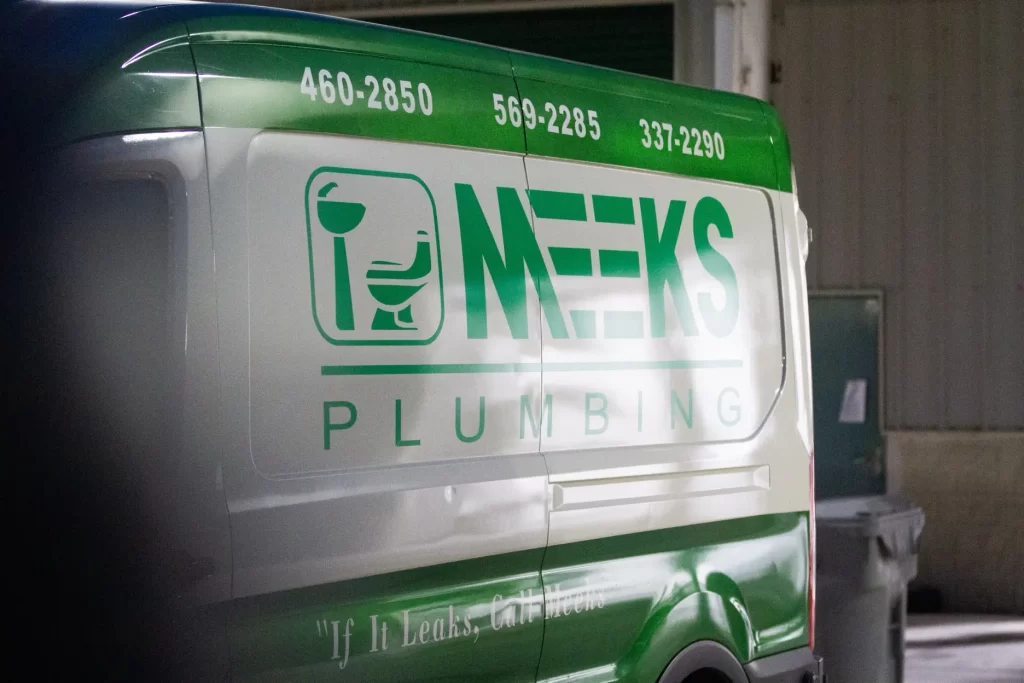 side of meeks truck with logo